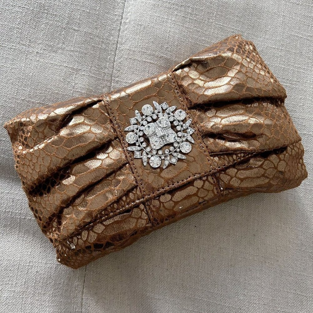 Iman Bronze Metallic Snake Embossed Bow Shaped Clutch with Crystal Embellishment